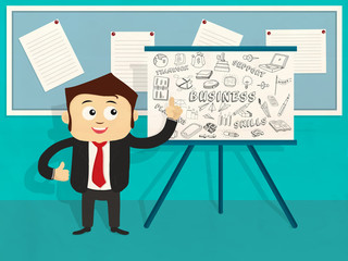 Young businessman with various business infographic elements.