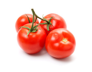 Fresh red tomatos isolated on white background