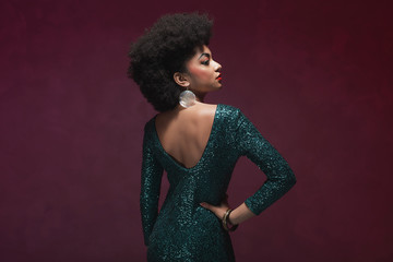 Stylish woman in elegant green dress