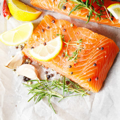 Raw salmon on baking paper