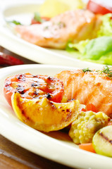 Fried salmon fillet with vegetables