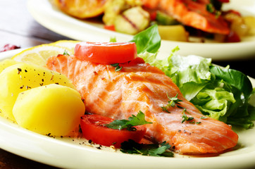 Fried salmon fillet with vegetables