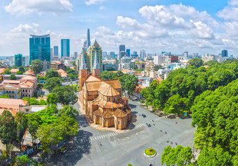 Fototapeta Ho Chi Minh City is a sunny day underneath Notre Dame buildings over a hundred years old, so far is the high-rise buildings for the economic development of Vietnam today obraz
