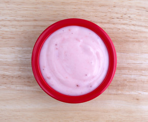 Strawberry yogurt in a small bowl