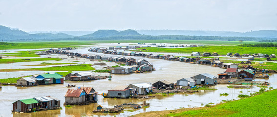 Panoramic riverside fishing villages of Dong Nai, Vietnam with hundreds of friends along the left...