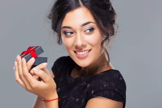 Smiling Woman Holding Jewelry Gift Box