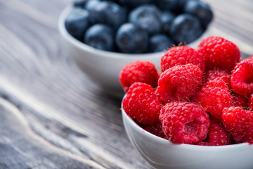 Raspberry in white bowl