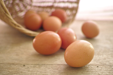 hen eggs on the wood desk