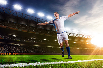Fototapeta na wymiar Soccer player in action panorama