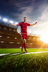 Fototapeta na wymiar Soccer player in action panorama