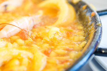 traditional seafood paella in spanish restaurant