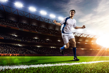 Soccer player in action panorama