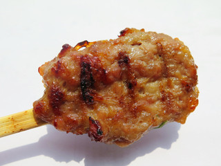 closed up the stick of thai roasted pork