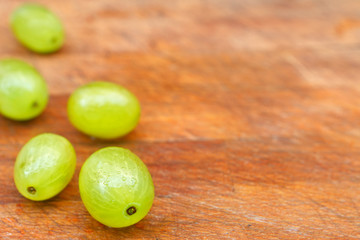 Grapes on wooden table