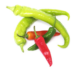 Colorful hot pepper and paprika pods on white, isolated.