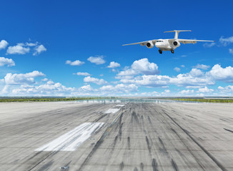 Passenger airplane landing on runway in airport.