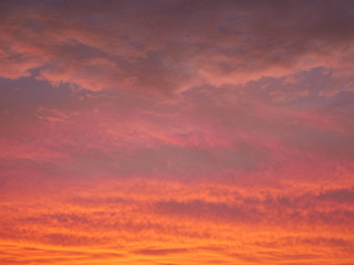 Sky with dramatic cloudy sunset and sun