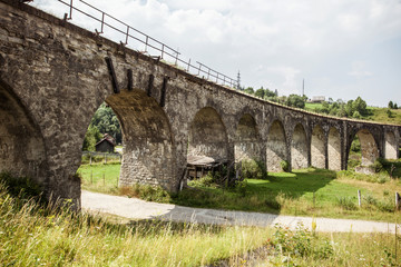 Fototapeta na wymiar Old railway bridge viaduct