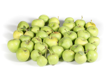 Little green apples on white