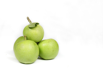 Several small green apples isolated on white, with blank space to write up and right