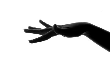 Obraz premium silhouette hand with water drop on the finger