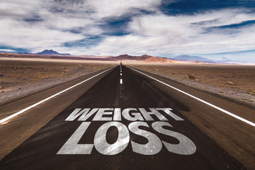 Weight Loss written on desert road