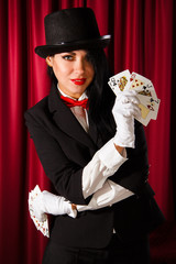 Magician with a pack of playing cards