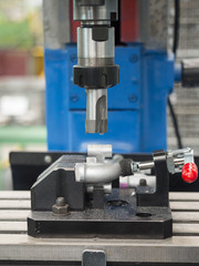 operator machining automotive parts by machining center