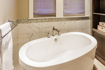 White Bathtub in Master Bathroom in Luxury Home