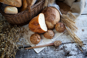 fresh bread and wheat on the wooden table