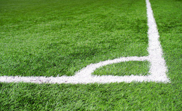 Corner area chalk line on artificial turf soccer or football field
