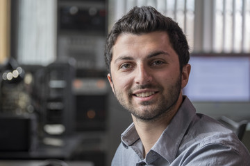 Naklejka premium Portrait of a Caucasian male in the office