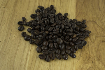 Coffee beans on wood block