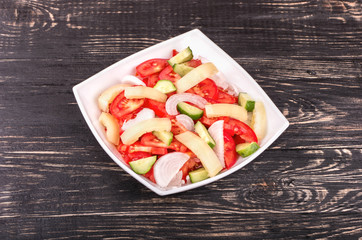 Salad with cucumbers and tomatoes