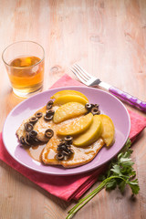 escalope with apple  and black olives