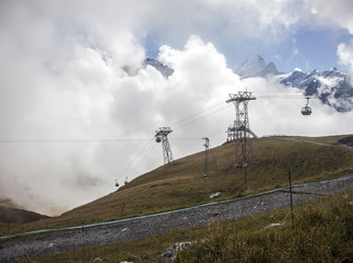 Mountain peaks and cable cars in Grindelwald, Switzerland