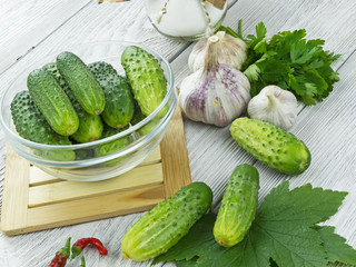 fresh cucumbers on a wooden table