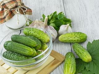 fresh cucumbers on a wooden table