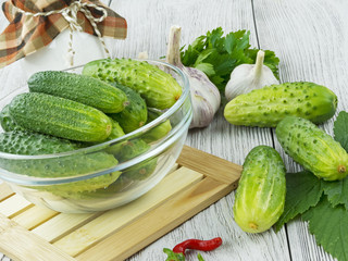 fresh cucumbers on a wooden table