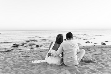 Fototapeta na wymiar Couple enjoying the beach