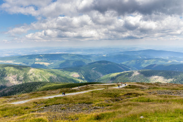 Landscape with mountain and land, nice clouds in Krkonose in Czech republic
