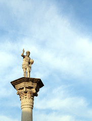 statue of Jesus Redeemer with the world in your hand