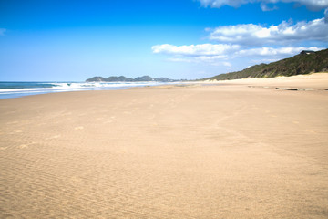 Fototapeta na wymiar Empty beach in the town of Ponta Do Ouro in Mozambique 