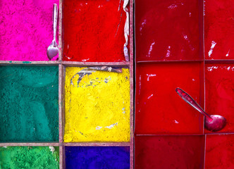 boxes with colourful powder paint