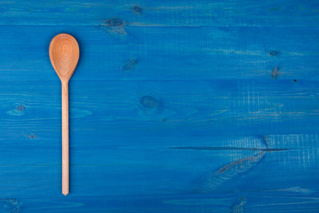 Wooden kitchen spoon background