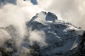 Crédence de cuisine en verre imprimé Cervin Clouds, ice and snow caps on Eiger,near Grindelwald, Switzerland