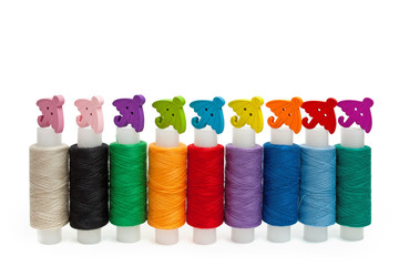 Colored thread and buttons-umbrellas