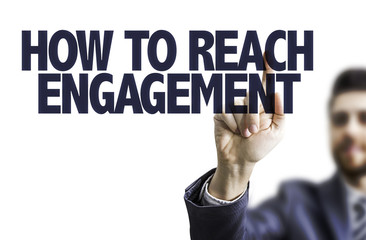 Business man pointing the text: How to Reach Engagement