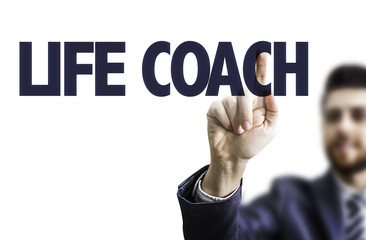 Business man pointing the text: Life Coach