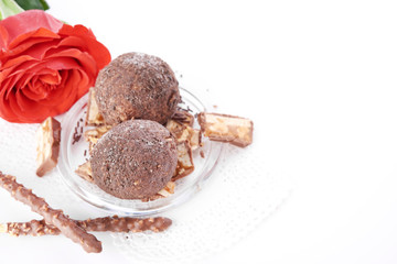 Cupcake with chocolate on wooden background